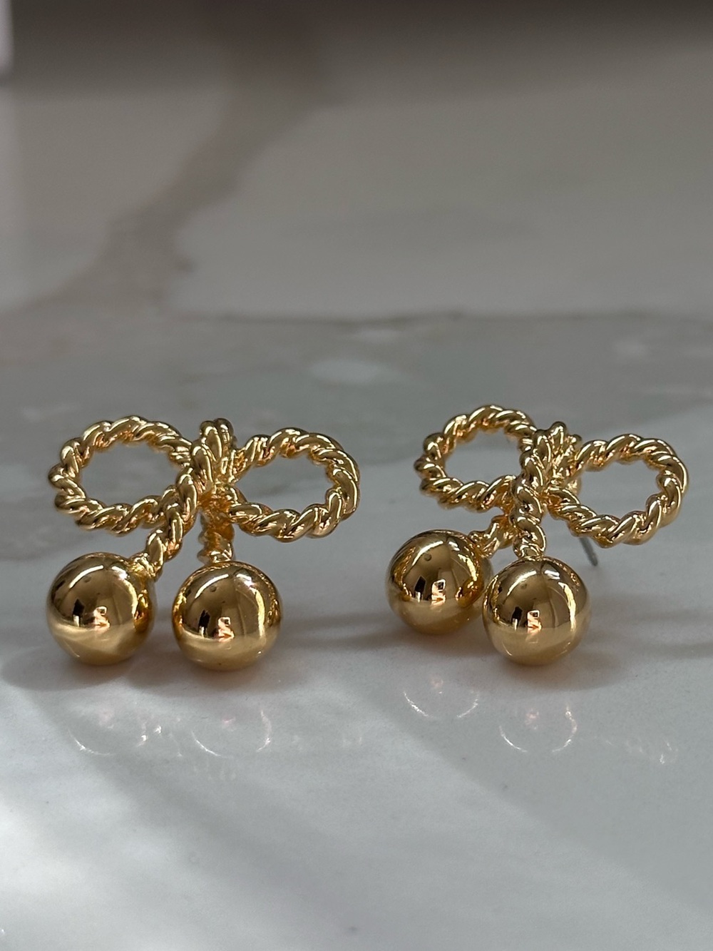 vintage gold tone joan rivers bow earrings